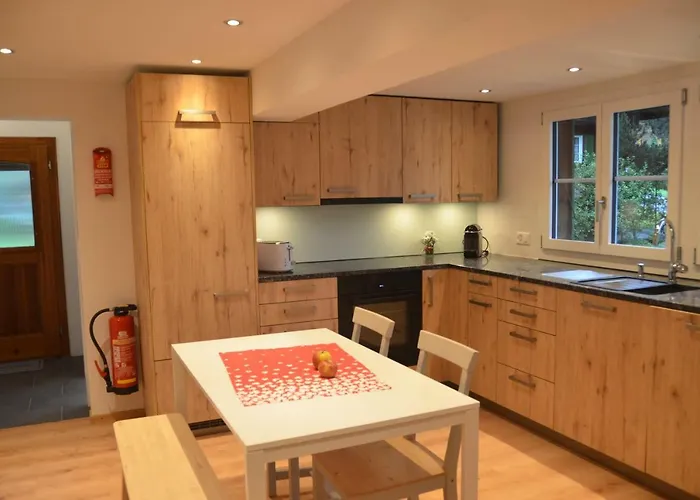 Fluehblueemli Apartman *